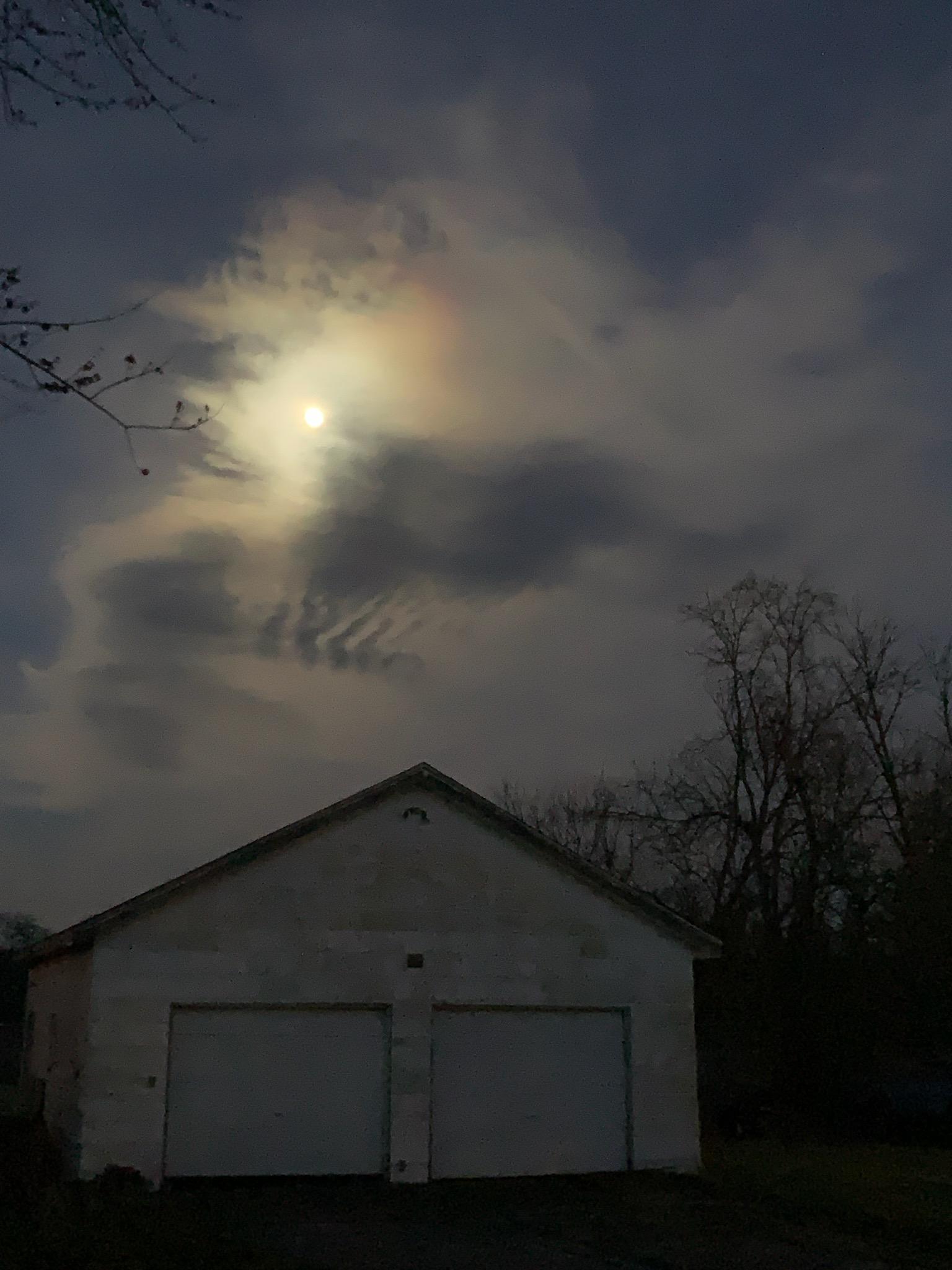 Photo of the moon and clouds over my garage last night